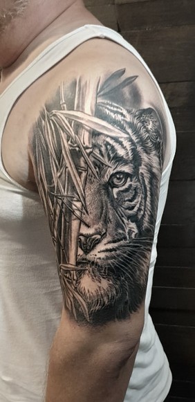 tiger with bambu tattoo.jpg